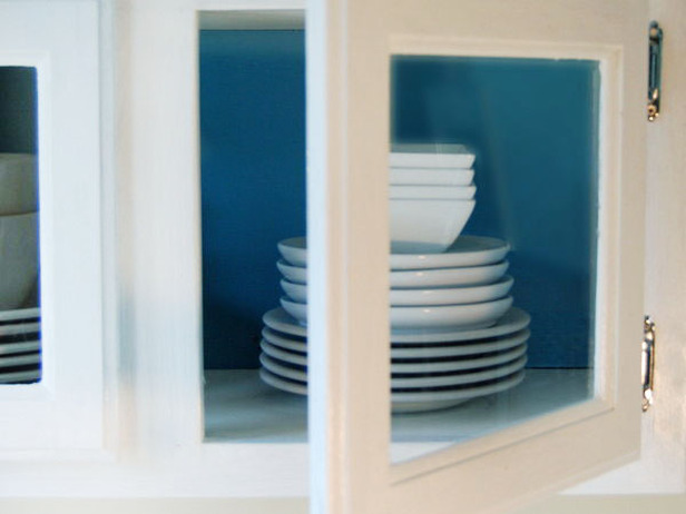 kitchen-cabinet-glass-doors-blue-paint-back-walls-accent