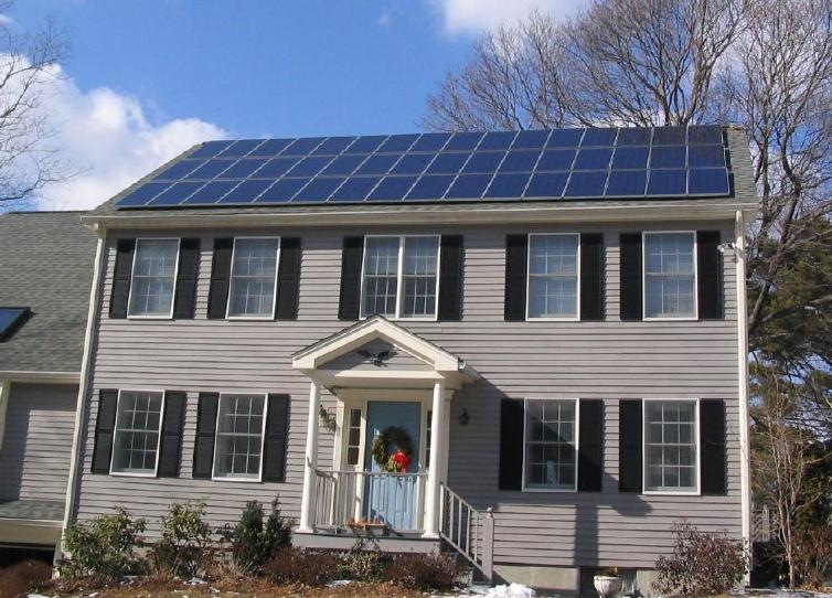 Eco Green Construction Solar_panels_on_house_roof_winter_view